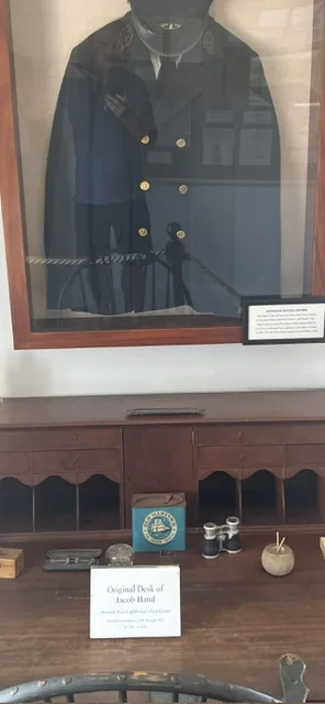 Original desk and keeper's uniform of Jacob Hand, first keeper of the Montauk Point Lighthouse